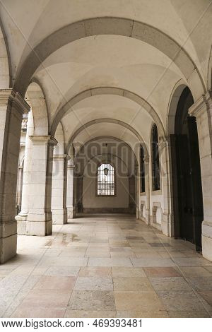 Mafra, Lisbon, Portugal- January 17, 2023: Corridor, Arches, Marble Staircase And Lamps Of The Palac