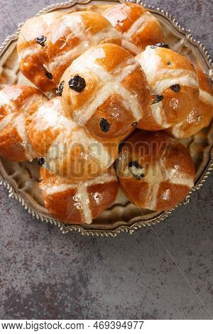 Homemade Hot Cross Buns Ready For Easter Closeup On The Plate On The Table. Vertical Top View From A
