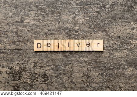 Deliver Word Written On Wood Block. Deliver Text On Table, Concept.