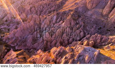 Colourful Mountains. Red And Pink Valley At Sunset. Tourist Attractions Goreme, Cappadocia, Turkey.