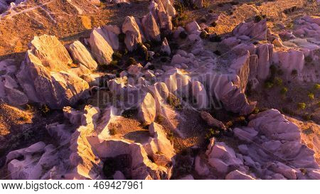 Colourful Mountains. Red And Pink Valley At Sunset. Tourist Attractions Goreme, Cappadocia, Turkey.