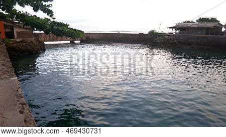 Afternoon Sea View And Sea-wall, Beach, And Coral, Sunset Background On Santolo Beach Indonesia