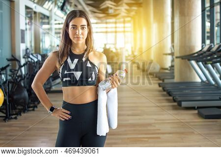 Fitness Woman Taking A Break After Workout At Gym.