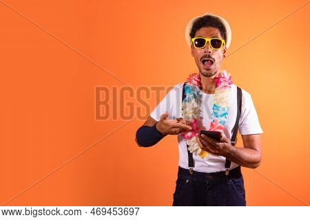 Carnival Brazilian Outfit. Black Man With Carnival Costume Holding Mobile