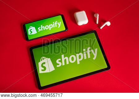 Tokio, Japan - June 05, 2022: Shopify Web Page Displayed On A Modern Laptop, Smartphone And Notebook
