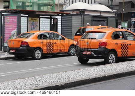 Curitiba, Brazil - October 7, 2014: Taxi Cabs Drive In Curitiba, Brazil. Curitiba Is The 8th Most Po