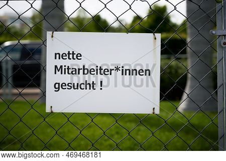 Sign In Front Of A Company Premises In Germany With The Inscription Nette Mitarbeiter Und Mitarbeite