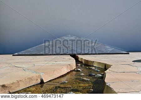 Costa Mesa, California - 24 Jan 2023: The Noguchi Garden, Closeup Of Water Use, A Granite Wedge And 