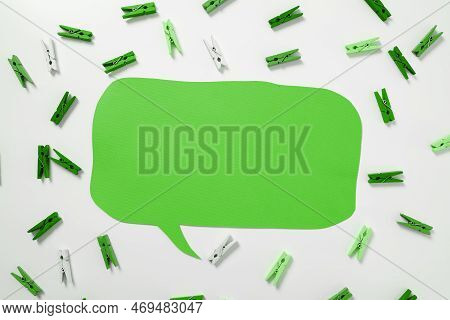 Important Messages. Sticker Lying On White Desk With Clotherspins. Crutial Informations Memos. White