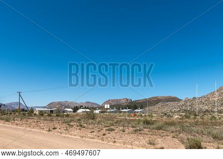 Koue Bokkeveld, South Africa - Sep 9, 2022: Farm Worker Houses And A Rugby Field On Road R303 In The