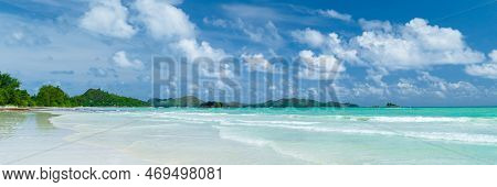 White Tropical Beach With Turquoise Colored Ocean Anse Volbert Beach Praslin Seychelles Islands.