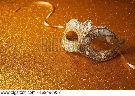 Masquerade Venitian, Mardi Gras Carnival Mask On Glitter Background.