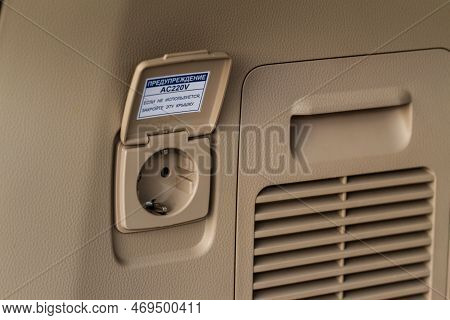 220v Power Outlet Socket In The Car. Opened Sockets.