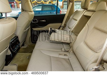 Modern Car Inside. Leather Passenger Seats With Opened Armrest. Comfortable Leather Seats. Central A