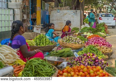 Puttaparthi, Andra Pradesh - India - January 21.2023: Womens On The Local Indian Vegetable Market, S