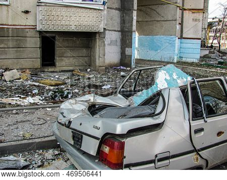 Kharkiv, Kharkov, Ukraine - 05.07.2022: Broken Crashed Civil Car Vehicle Destruction Burnt House Bui