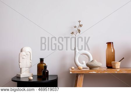 Interior Design Of Living Room Interior With Wooden Bench, Black Round Coffee Table, Glass Vase, Bri