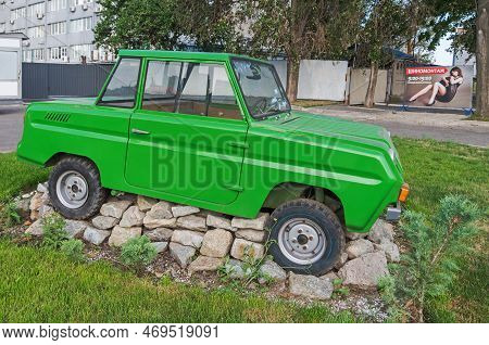 Dnipro, Ukraine - August 29, 2021: Monument Soviet Microcar Smz S-3d. They Were Specially Designed F