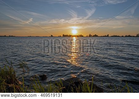 Sunset At The Tjeukemeer In The Netherlands