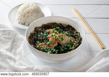 Korean Seaweed Soup With Meat In A White Bowl And Boiled Rice. Birthday Soup. Traditional Korean Cui