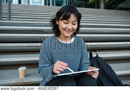 Smiling Girl, Graphic Designer, Using Digital Tablet And Pen Tool To Draw, Does Home Assignment For 
