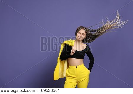 Beautiful Woman With Long African Braids On Purple Background, Space For Text