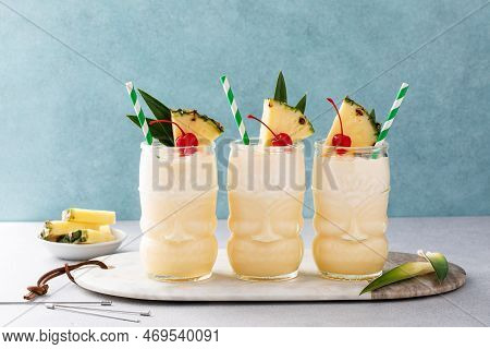 Tropical Pina Colada Cocktail Or Mocktail In A Tiki Glass