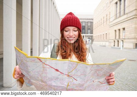 Redhead Girl, Tourist Explores City, Looks At Paper Map To Find Way For Historical Landmarks, Woman 