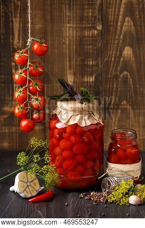 Pickled Cherry Tomatoes With Garlic, Dill And Spices. Homemade Food. Canned Tomatoes In Closed And O