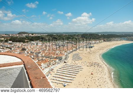 Nazare, Portugal - August 16, 2022: Aerial View Of The Praia De Nazare,nazare Beach, And The City Of
