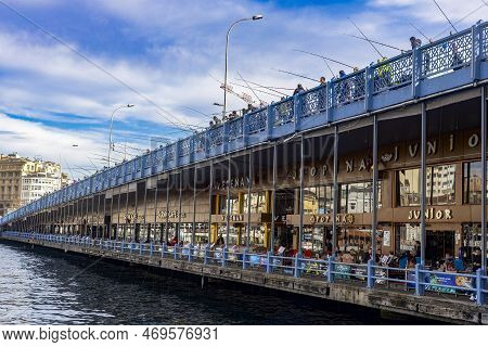 Istanbul Turkey January 22, 2023, Fishermen Catch Fish On The Galata Bridge, Many Fishermen Daily On