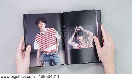 Fan Holding Stray Kids Maxident Mini Album Photobook On Grey. Music Cd. South Korean Boy Band Strayk