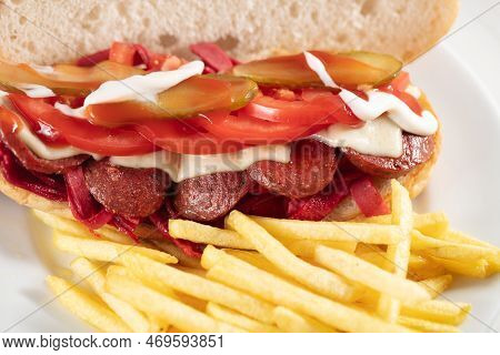 Kumru Is A Turkish Sandwich On A Bun, Typically With Cheese, Tomato, And Sausage. The Name Of This S