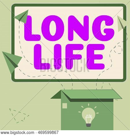 Hand Writing Sign Long Life. Word Written On Able To Continue Working For Longer Than Others Of The 