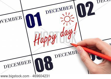 1st Day Of December. Hand Writing The Text Happy Day And Drawing The Sun On The Calendar Date Decemb