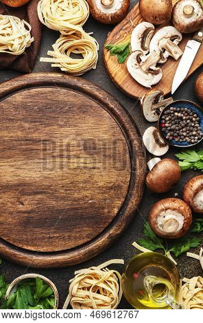Uncooked Pasta, Brown Champignons Mushrooms, Vegetables, Cheese - Ngredients For Tasty Cooking On Ol