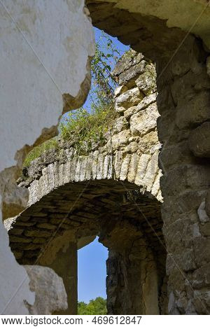 Ruins Of Ancient Building Against Blue Sky. Collapsed Ceiling. Masonry, Room With Arched Vaults In C