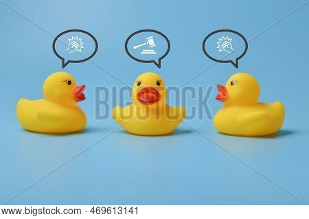 Toy Duck Characters Fighting Over One Person. Avoidance Bullying, Violence And People Protection