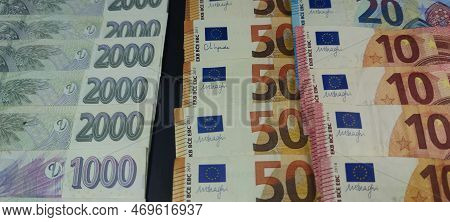 A View Of Czech And Euro Banknotes Stacked On Top Of Each Other, Pohled