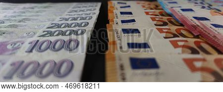 Detailed View Of Czech And Euro Banknotes Stacked On Top Of Each Other, Photo