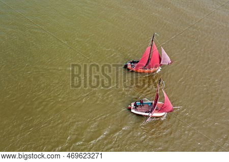Aerial Top Shot From Traditional Dutch Wooden Boats At The Ijsselmeer Near The Harbor From Laaxum In