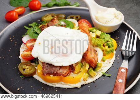 Kebab With Bacon And Fried Egg, Tomato, Spinach, Avocado, Pickled Peppers