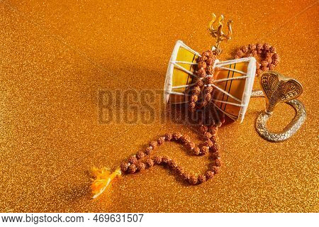 Shivaratri Background With Shivas Trident And Pellet Drum Damroo Musical Instrument . Hindu Festival