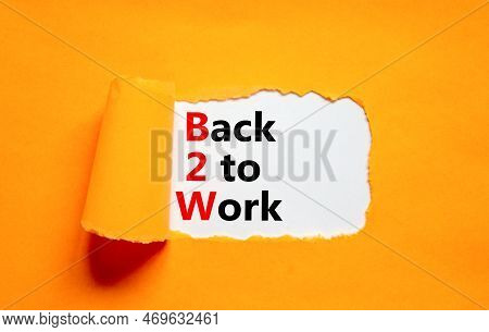 B2w Back To Work Symbol. Concept Words B2w Back To Work On White White Paper On A Beautiful Orange B