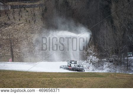 Artificial Snow Production By A Snow Lance With Piste Equipment That Prepares The Snow In Front Of G