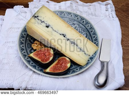 French Semi-soft Cow Milk Cheese Morbier From Franche-comte Region With Thin Black Layer And Strong