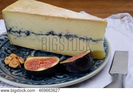 French Semi-soft Cow Milk Cheese Morbier From Franche-comte Region With Thin Black Layer And Strong