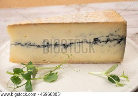 French Semi-soft Cow Milk Cheese Morbier From Franche-comte Region With Thin Black Layer And Strong