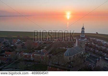 Aerial From The Historical Village Hindeloopen At The Ijsselmeer In Friesland The Netherlands At Sun