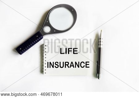 Irrevocable Trust Text On Notepad With Glasses, Magnifier And Notepad
